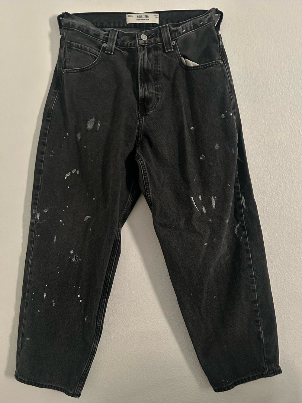 Hollister Men's Black Relaxed Jeans with White Paint Details